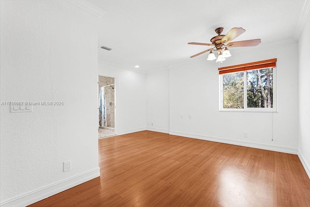 11201 SW 1st St, Plantation, FL 33325 - unfurnished room with wood finished floors, crown molding, baseboards, and a ceiling fan