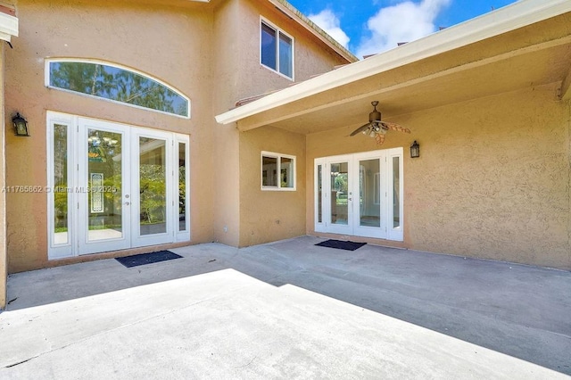 11201 SW 1st St, Plantation, FL 33325 - exterior space featuring stucco siding, a ceiling fan, french doors, and a patio