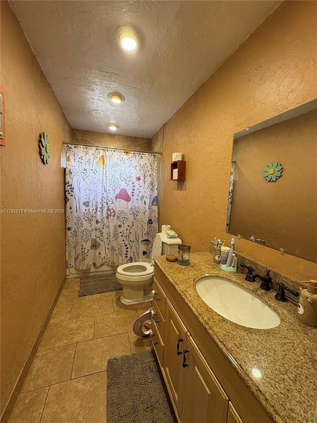 12021 SW 119th St, Miami, FL 33186 - bathroom featuring vanity, a textured ceiling, a textured wall, a shower with curtain, and tile patterned flooring