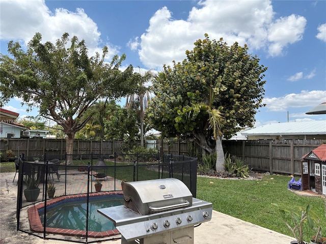 12021 SW 119th St, Miami, FL 33186 - fenced backyard featuring a patio area