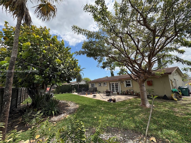 12021 SW 119th St, Miami, FL 33186 - back of house featuring a patio and french doors