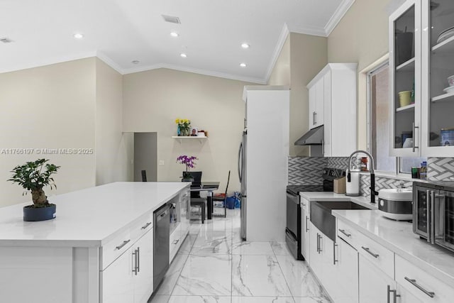 kitchen featuring black range with electric cooktop, backsplash, under cabinet range hood, and visible vents