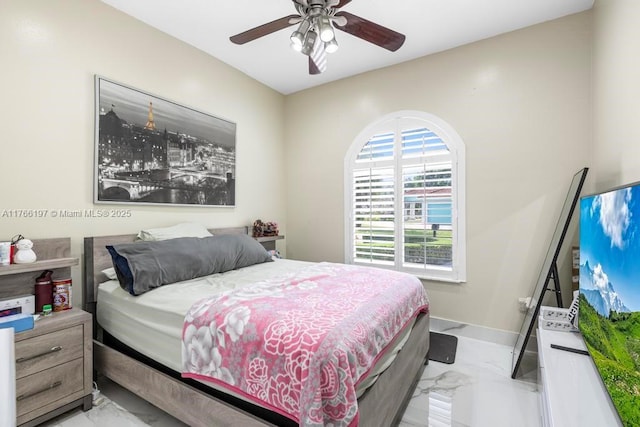 bedroom with baseboards, marble finish floor, and ceiling fan