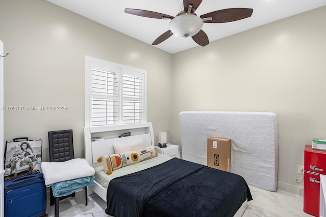 bedroom with a ceiling fan and marble finish floor