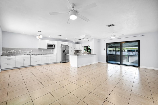 8451 NW 10th St, Pembroke Pines, FL 33024 - unfurnished living room featuring a ceiling fan and light tile patterned floors