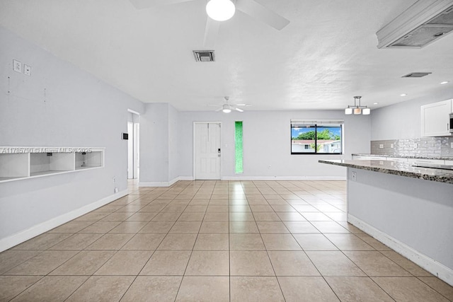 8451 NW 10th St, Pembroke Pines, FL 33024 - unfurnished living room featuring ceiling fan, light tile patterned floors, and recessed lighting