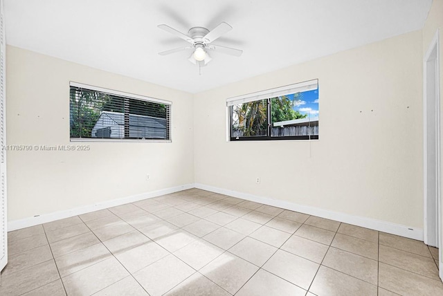 8451 NW 10th St, Pembroke Pines, FL 33024 - empty room featuring a ceiling fan and light tile patterned flooring