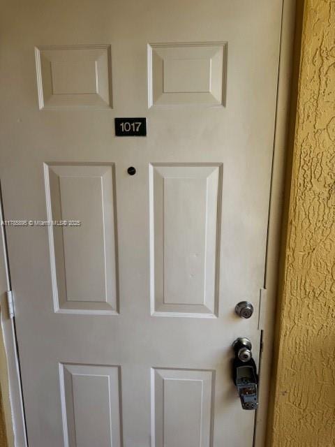 1017 Shoma Dr Unit 462, Royal Palm Beach, FL 33414 - doorway to property with stucco siding
