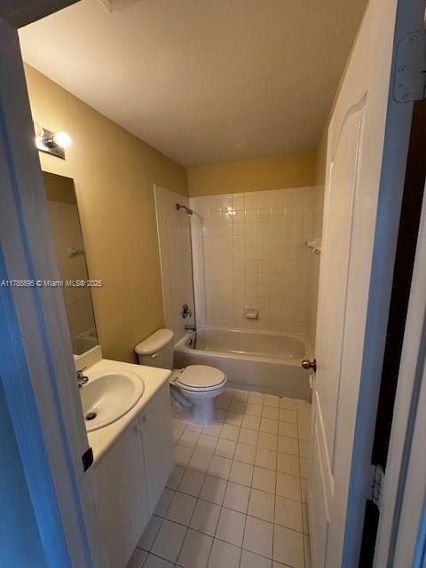 1017 Shoma Dr Unit 462, Royal Palm Beach, FL 33414 - bathroom with shower / bath combination, tile patterned flooring, vanity, and toilet