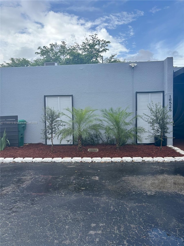 16528 Bridge End Rd, Miami Lakes, FL 33014 - view of home's exterior with stucco siding