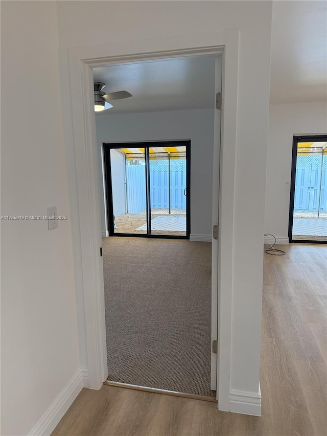 16528 Bridge End Rd, Miami Lakes, FL 33014 - hallway with wood finished floors