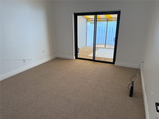 16528 Bridge End Rd, Miami Lakes, FL 33014 - carpeted spare room featuring baseboards