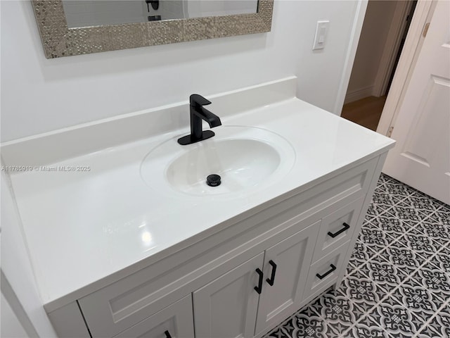 16528 Bridge End Rd, Miami Lakes, FL 33014 - bathroom featuring vanity and tile patterned flooring
