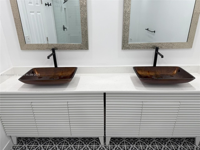 16528 Bridge End Rd, Miami Lakes, FL 33014 - full bathroom featuring double vanity, a tile shower, and tile patterned flooring