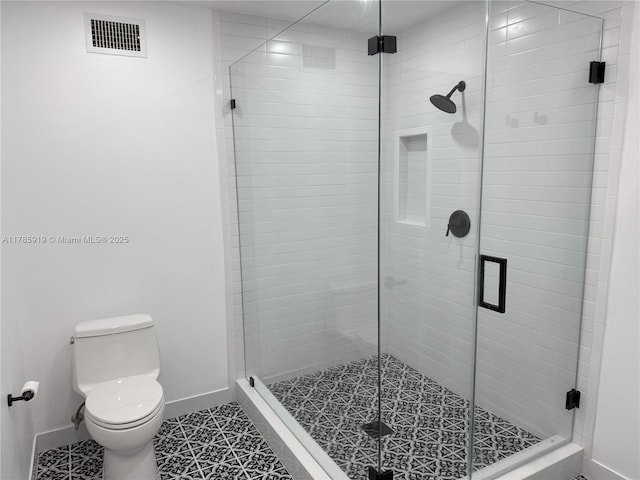 16528 Bridge End Rd, Miami Lakes, FL 33014 - full bath with baseboards, visible vents, a shower stall, and toilet