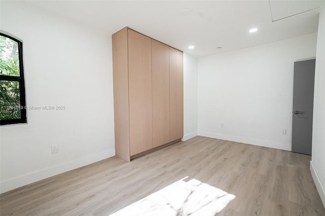 751 NE 80th St, Miami, FL 33138 - spare room with recessed lighting, light wood-type flooring, and baseboards
