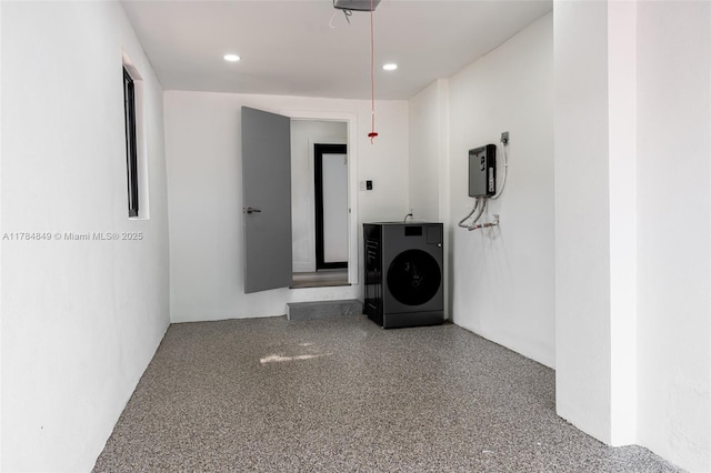 751 NE 80th St, Miami, FL 33138 - hall with speckled floor, recessed lighting, and washer / clothes dryer