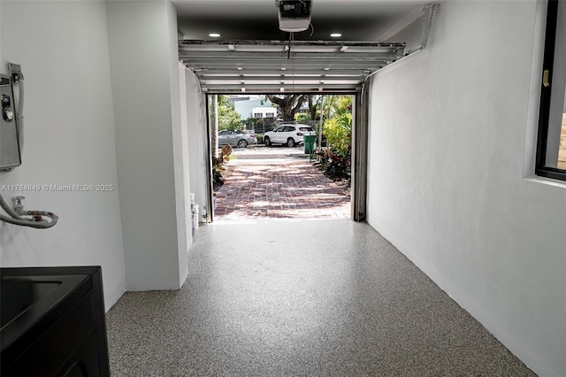 751 NE 80th St, Miami, FL 33138 - garage featuring a garage door opener