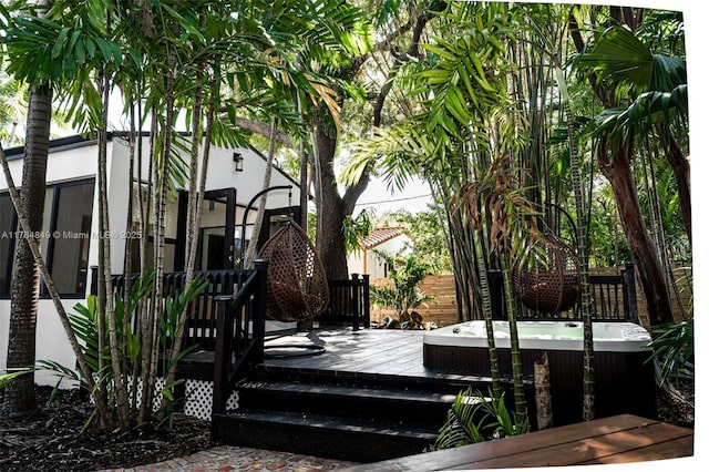 751 NE 80th St, Miami, FL 33138 - deck featuring fence and a hot tub
