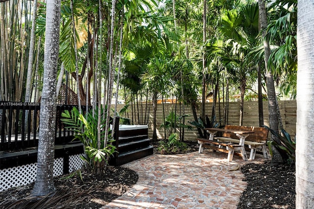 751 NE 80th St, Miami, FL 33138 - view of patio with a wooden deck and a fenced backyard