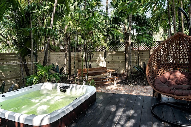 751 NE 80th St, Miami, FL 33138 - wooden deck with a fenced backyard and hot tub deck surround