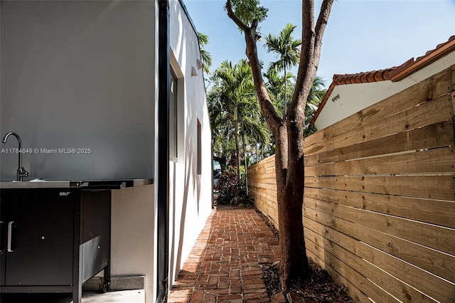 751 NE 80th St, Miami, FL 33138 - view of side of property featuring fence