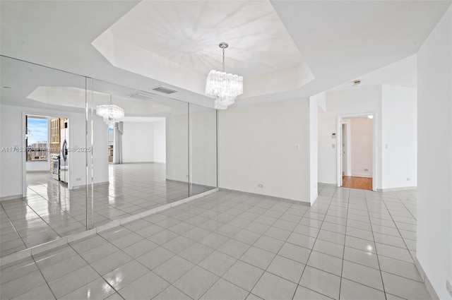 20191 E Country Club Dr Unit Ts3, Aventura, FL 33180 - unfurnished room with a chandelier, a raised ceiling, tile patterned flooring, and baseboards