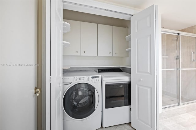20191 E Country Club Dr Unit Ts3, Aventura, FL 33180 - laundry room with cabinet space and washing machine and clothes dryer