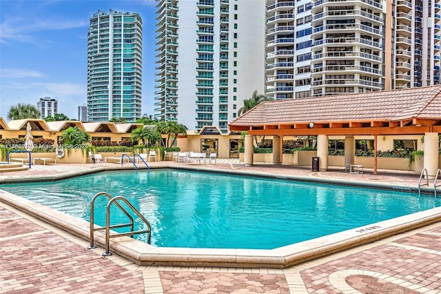 20191 E Country Club Dr Unit Ts3, Aventura, FL 33180 - community pool with a patio