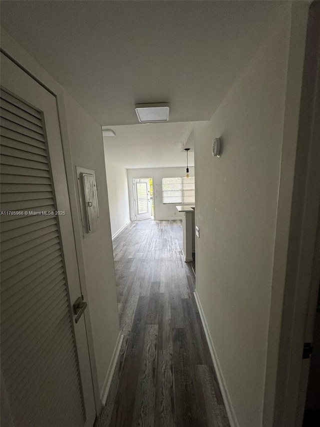 22 Suffolk A 22, Boca Raton, FL 33434 - hallway featuring dark wood-style floors and baseboards
