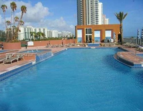 community pool with a patio