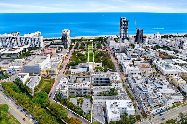 aerial view featuring a water view and a view of city