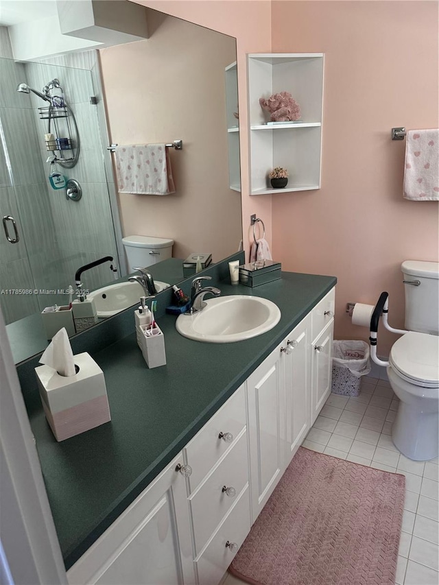 full bathroom with a stall shower, tile patterned floors, vanity, and toilet