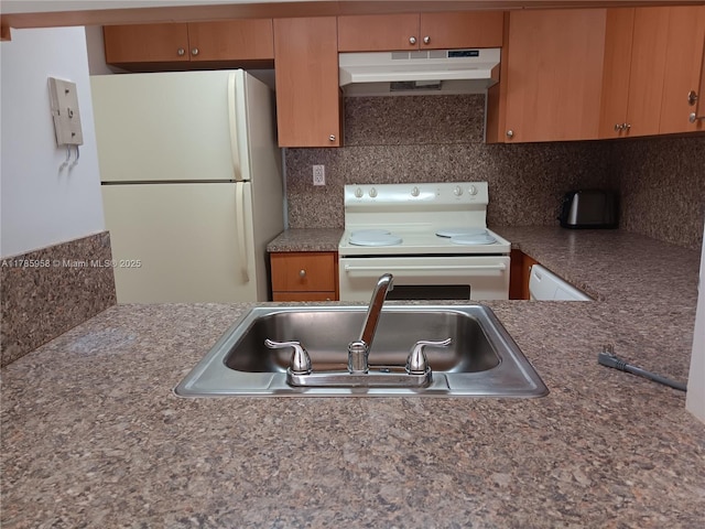 9688 Fontainebleau Blvd Unit 401, Miami, FL 33172 - kitchen featuring a sink, under cabinet range hood, white appliances, and tasteful backsplash