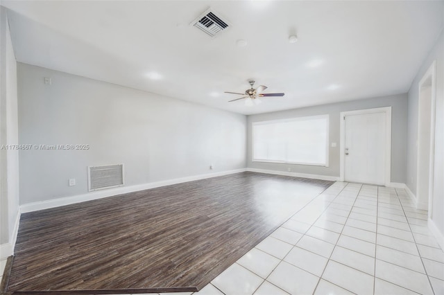 22188 SW 59th Ave, Boca Raton, FL 33428 - unfurnished room with baseboards, a ceiling fan, visible vents, and light wood-style flooring