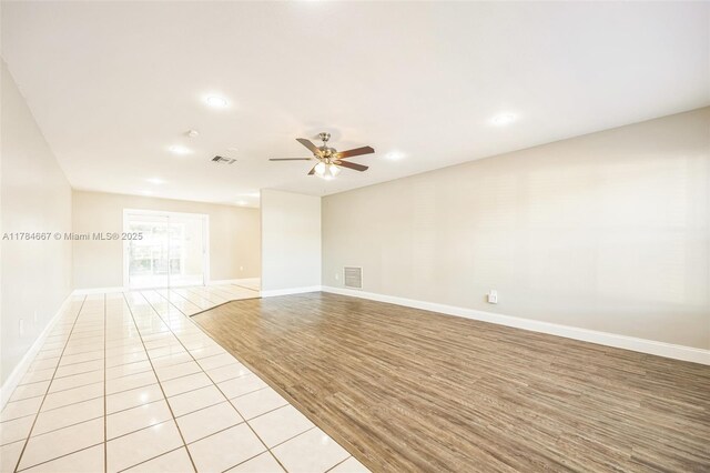 22188 SW 59th Ave, Boca Raton, FL 33428 - empty room with light tile patterned flooring, ceiling fan, baseboards, visible vents, and recessed lighting