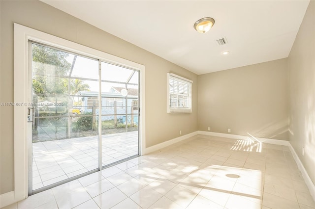22188 SW 59th Ave, Boca Raton, FL 33428 - unfurnished room with baseboards, visible vents, and a healthy amount of sunlight