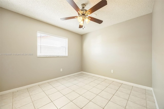 22188 SW 59th Ave, Boca Raton, FL 33428 - spare room featuring ceiling fan, baseboards, light tile patterned flooring, and a textured ceiling