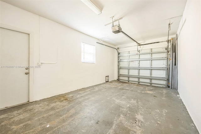 22188 SW 59th Ave, Boca Raton, FL 33428 - garage featuring a garage door opener