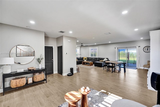 29074 SW 168th Ct, Homestead, FL 33030 - living room with recessed lighting, a ceiling fan, visible vents, and light wood-style flooring