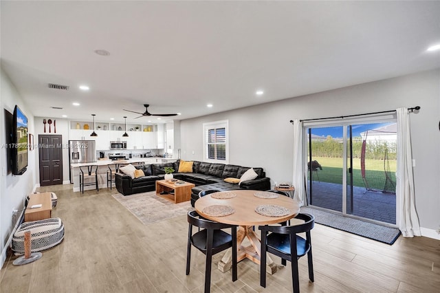 29074 SW 168th Ct, Homestead, FL 33030 - dining space featuring recessed lighting, light wood-type flooring, visible vents, and ceiling fan