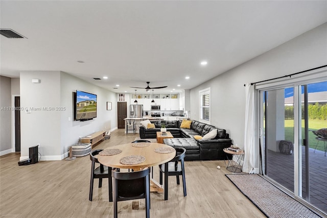 29074 SW 168th Ct, Homestead, FL 33030 - dining area featuring light wood-type flooring, baseboards, visible vents, and recessed lighting