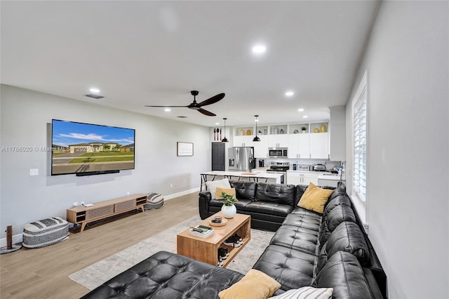 29074 SW 168th Ct, Homestead, FL 33030 - living area with recessed lighting, light wood-style flooring, a ceiling fan, and baseboards