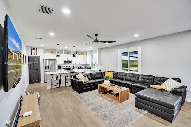 29074 SW 168th Ct, Homestead, FL 33030 - living area featuring light wood-style floors, visible vents, and recessed lighting