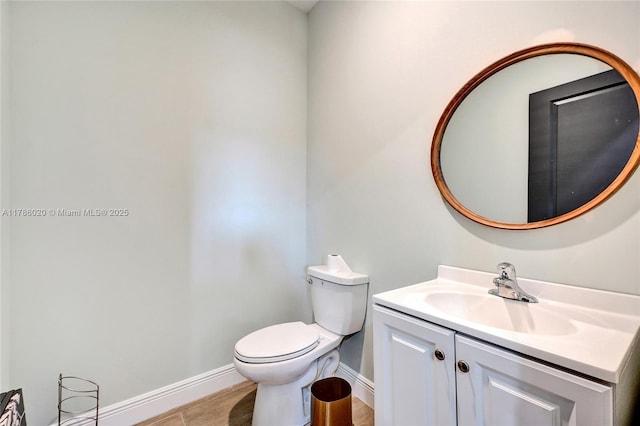 29074 SW 168th Ct, Homestead, FL 33030 - bathroom with baseboards, vanity, and toilet