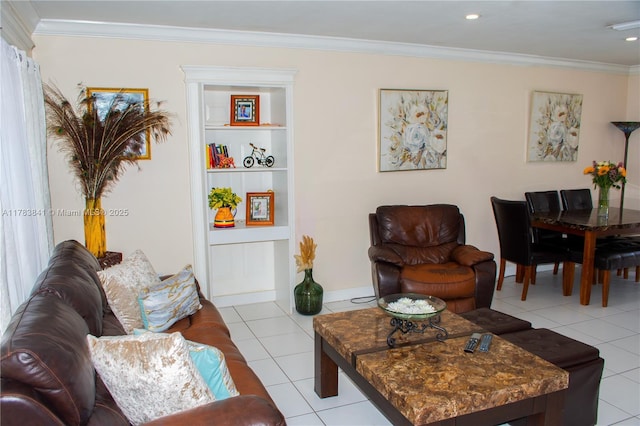 living area with ornamental molding and light tile patterned floors