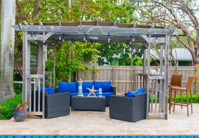 view of patio / terrace with fence, a pergola, and outdoor lounge area