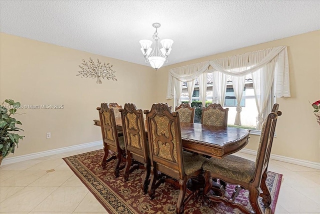 13063 NW 11th Ct, Sunrise, FL 33323 - dining room with a chandelier, light tile patterned floors, a textured ceiling, and baseboards