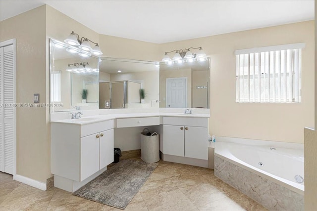 13063 NW 11th Ct, Sunrise, FL 33323 - full bath with a closet, vanity, a jetted tub, and tile patterned flooring