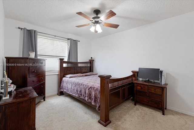 13063 NW 11th Ct, Sunrise, FL 33323 - bedroom featuring light colored carpet, a ceiling fan, baseboards, and a textured ceiling